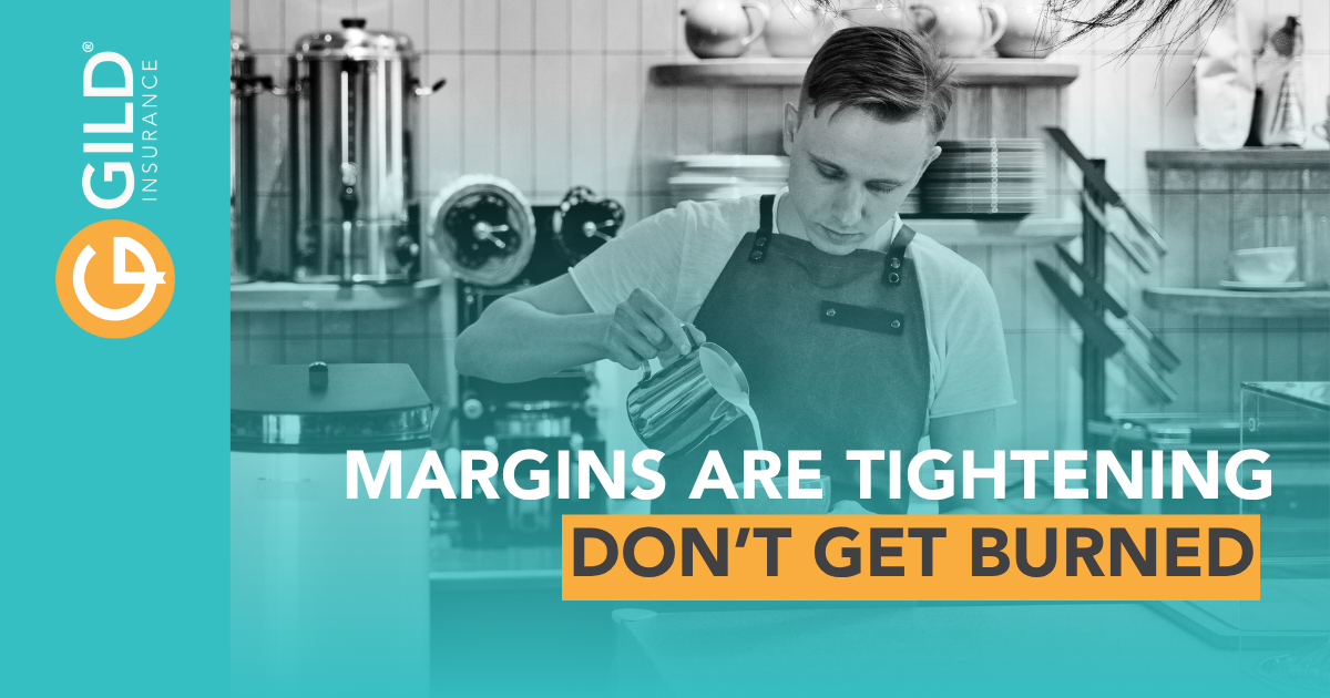 Coffee shop employee pouring coffee